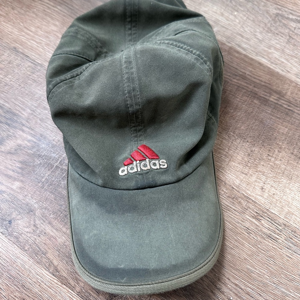 Green Adidas well-worn baseball cap
